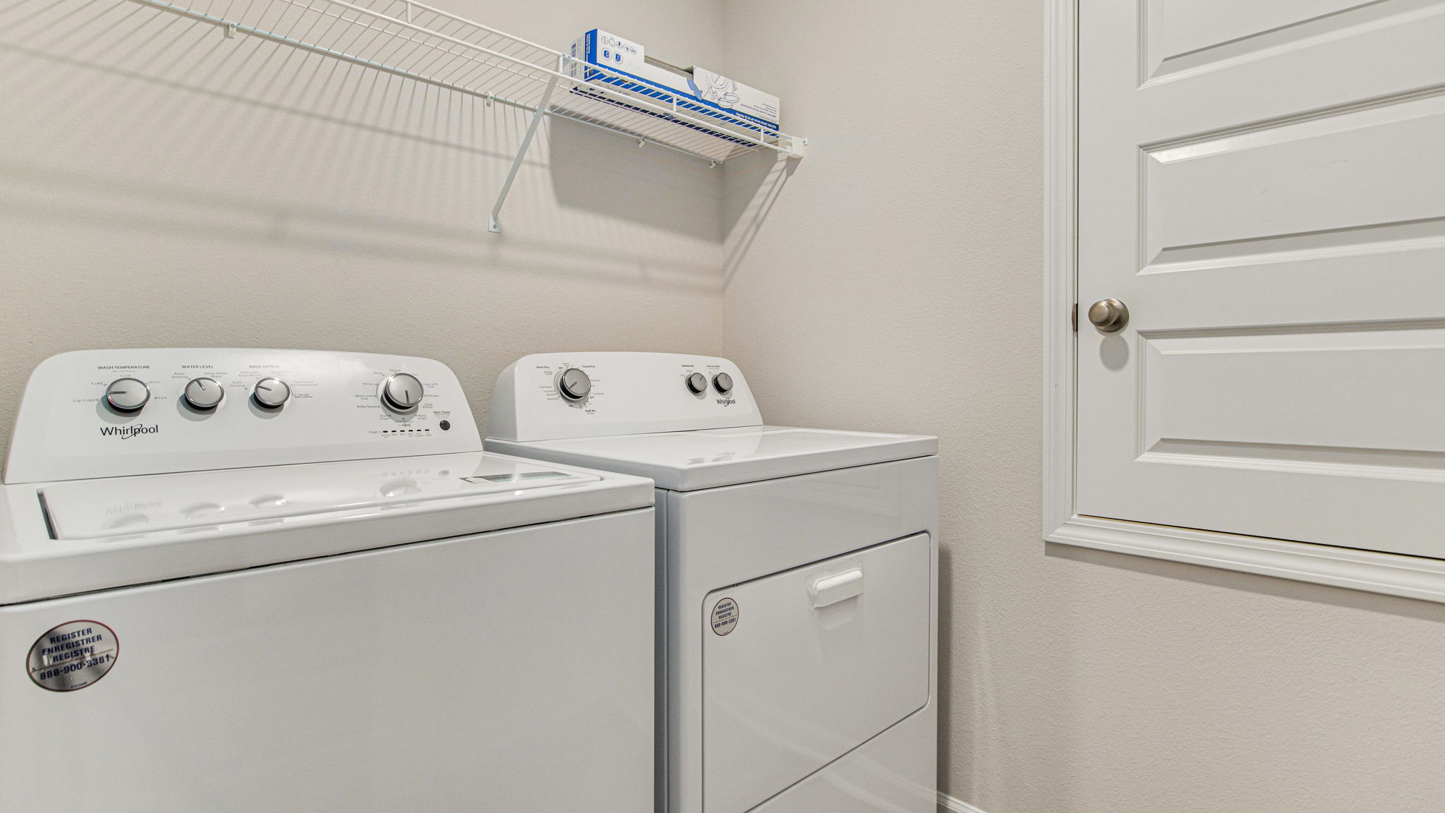 The Lakeside floorplan laundry room with EVP flooring throughout