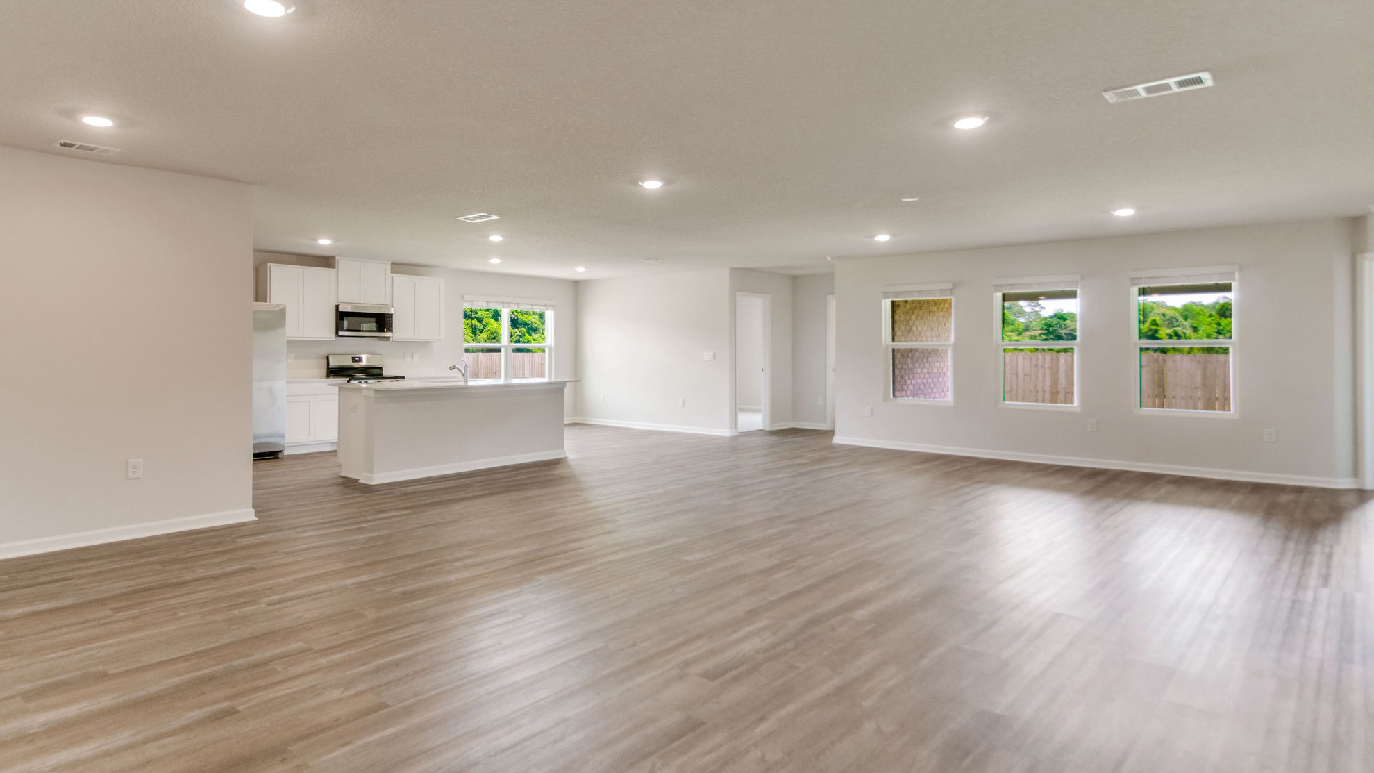 The Sawyer floorplan with an open concept main living space with EVP flooring throughout