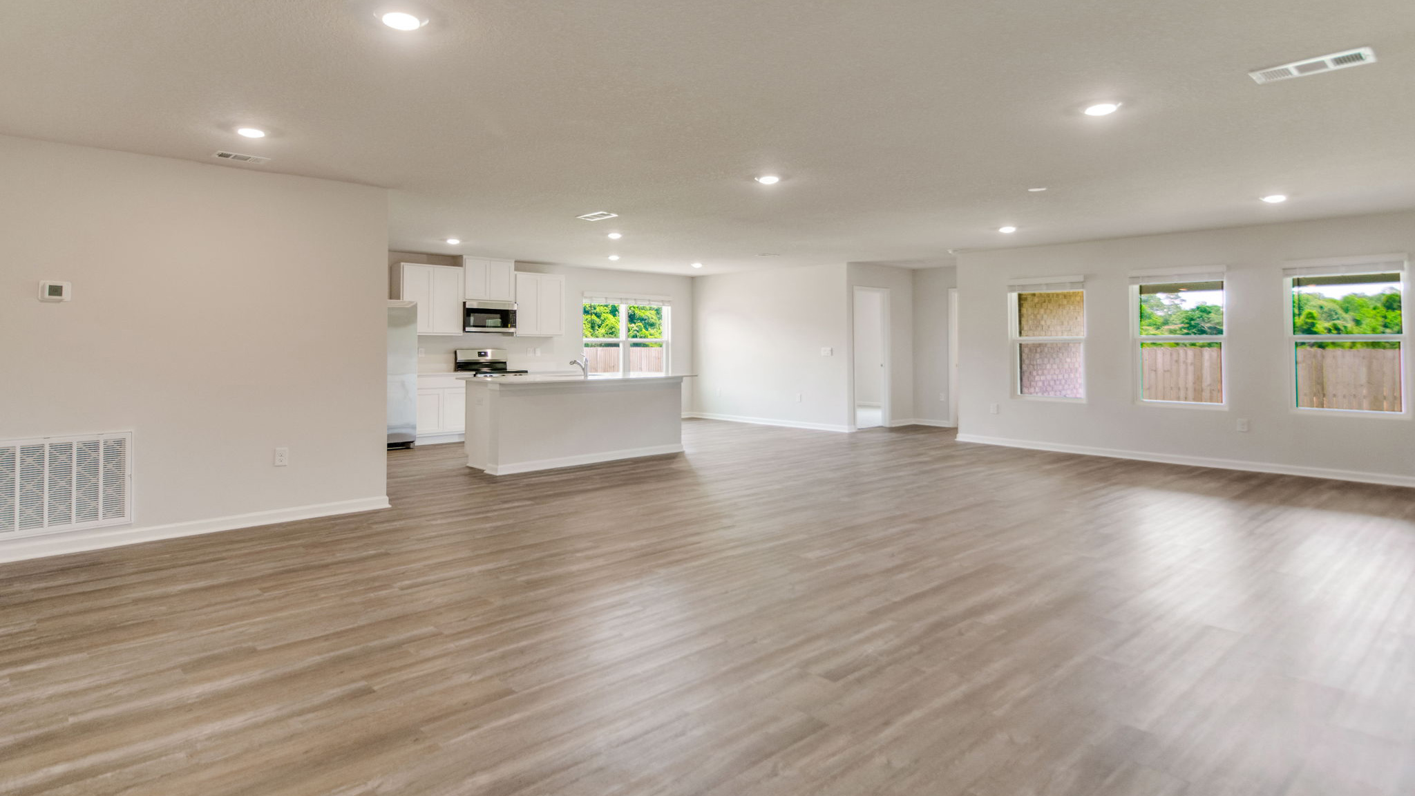 The Sawyer floorplan with an open concept kitchen, living room and dining room