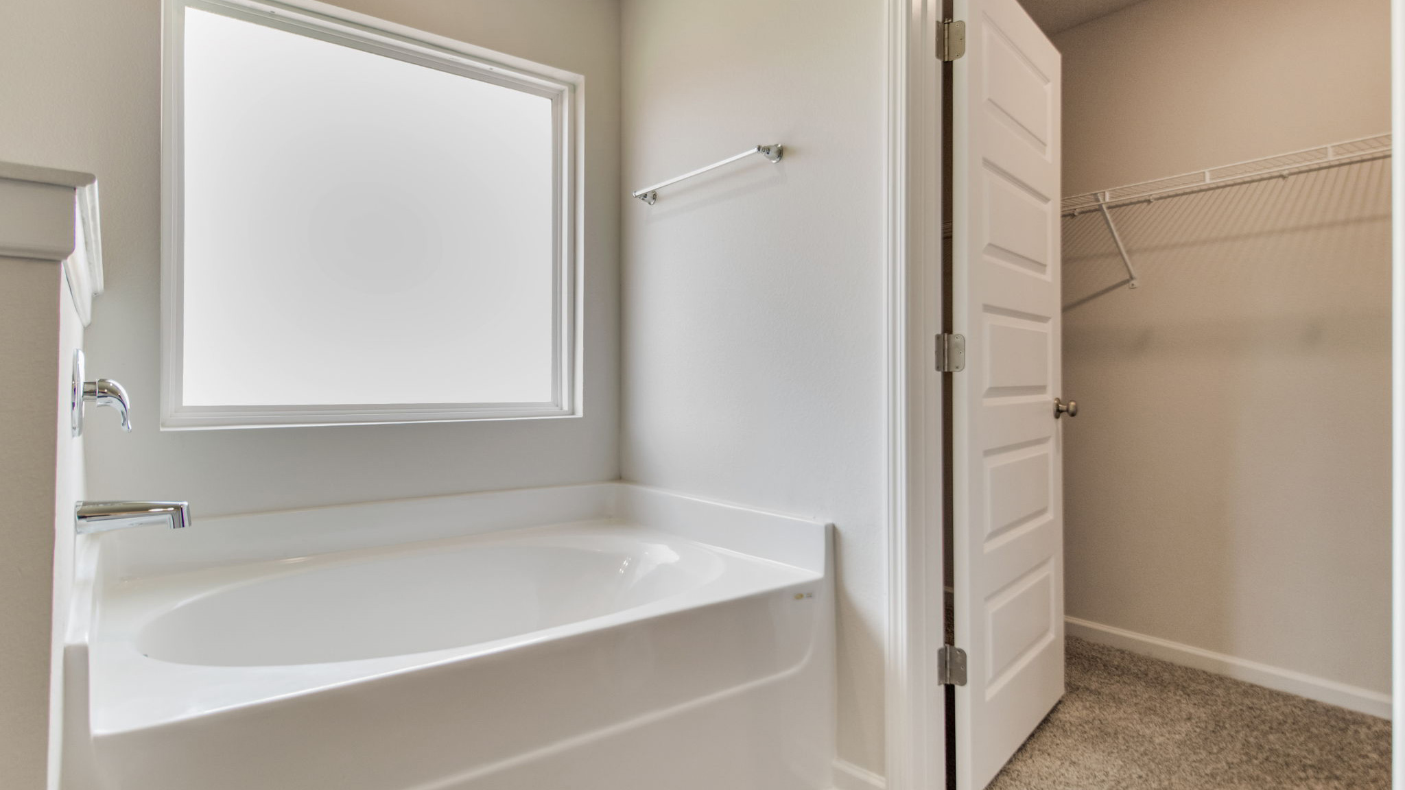 The Sawyer floorplan primary bathroom with soaking tub
