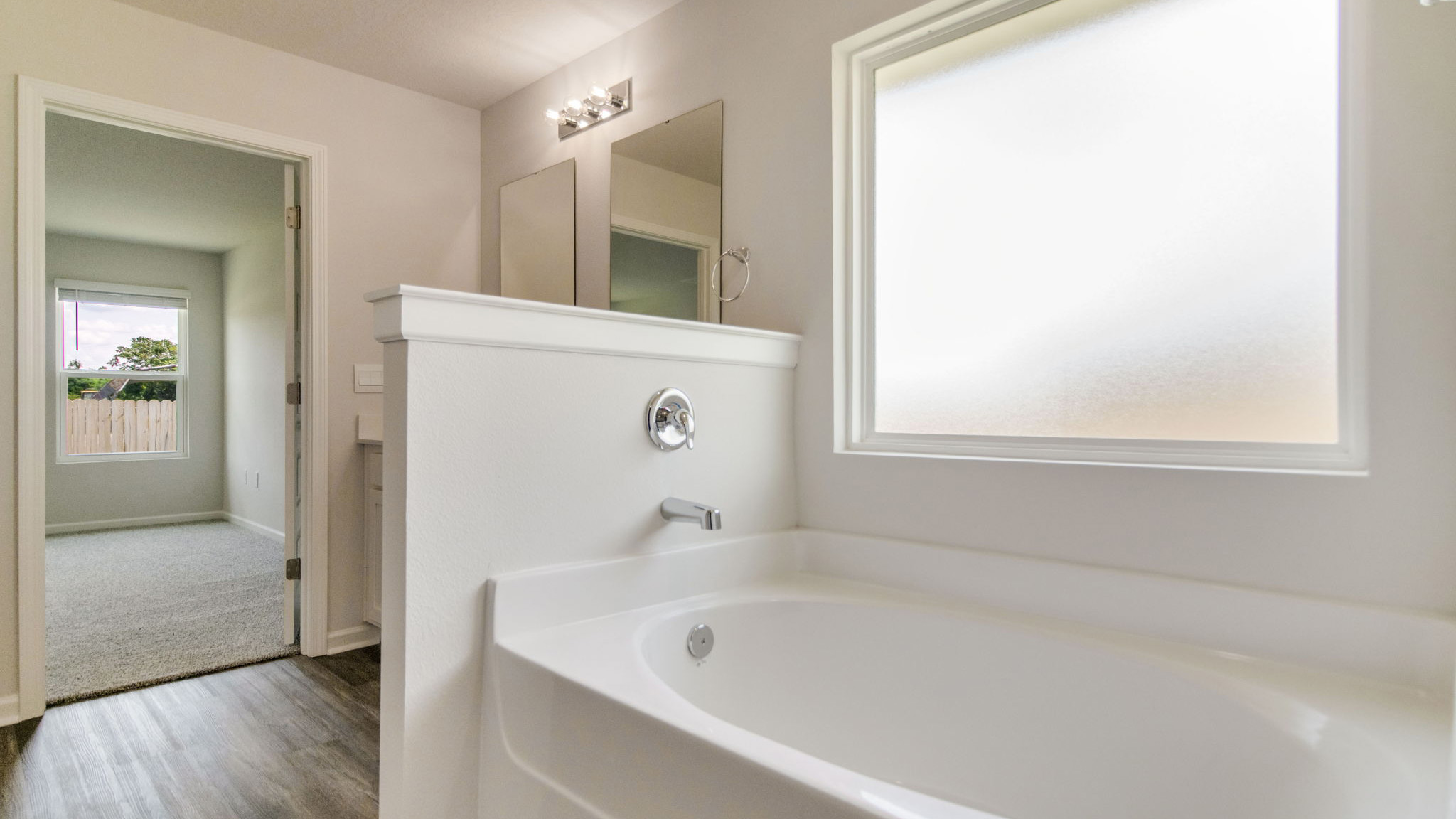 The Sawyer floorplan primary bathroom with soaking tub