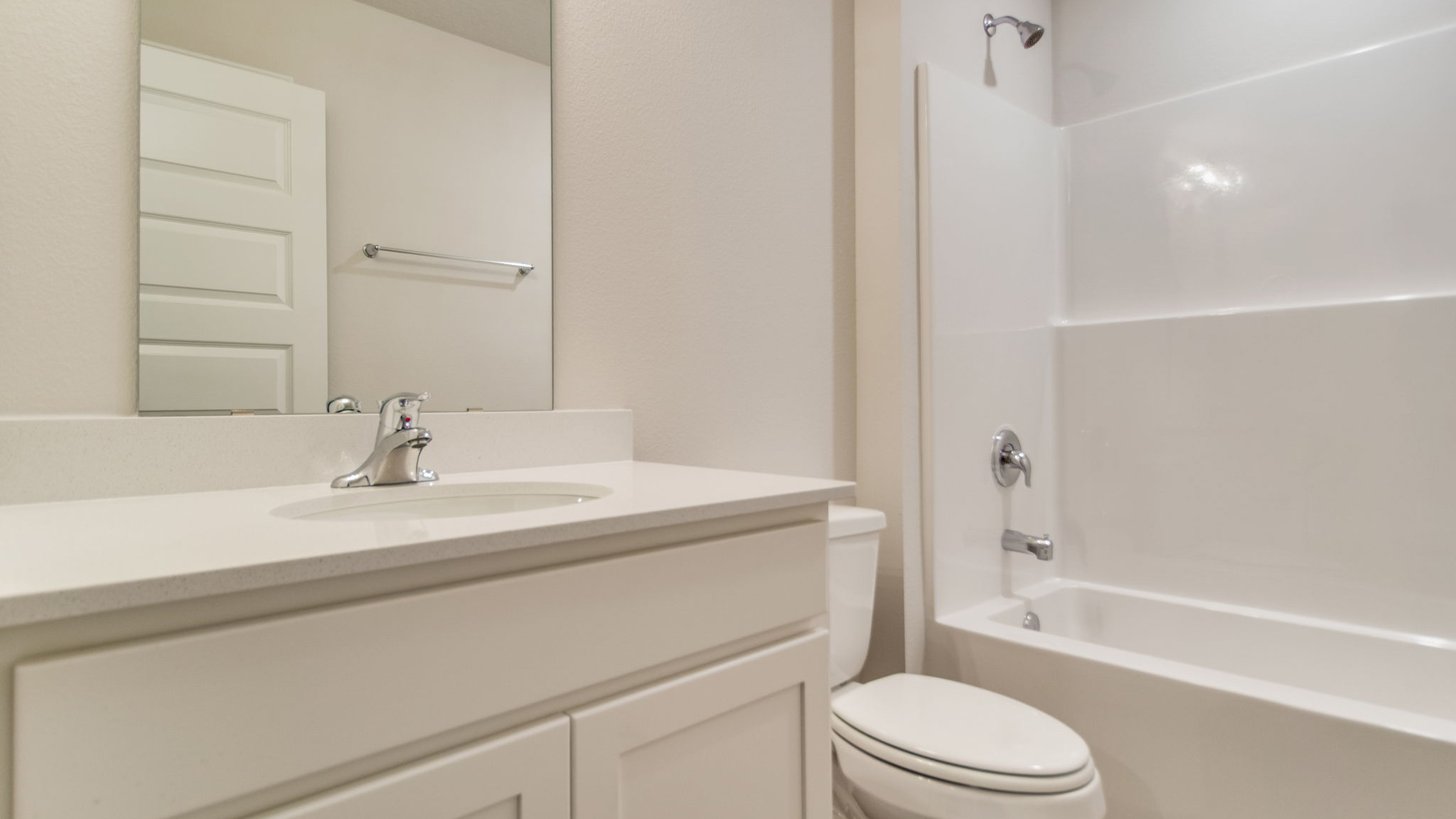 The Sawyer floorplan guest bathroom two with shower tub combo and single vanity
