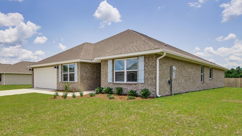 The Sawyer Floorplan at Charlie Day Estates with a brick exterior