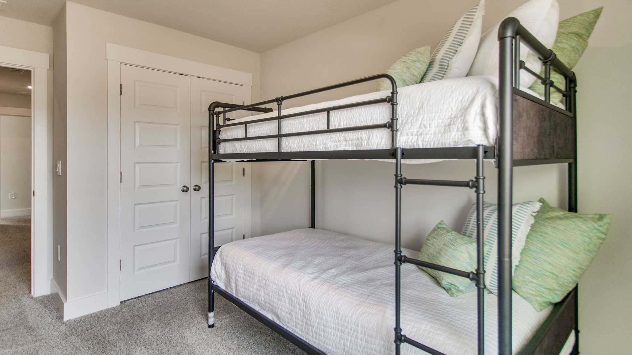 The Palm floorplan guest bedroom one with window view