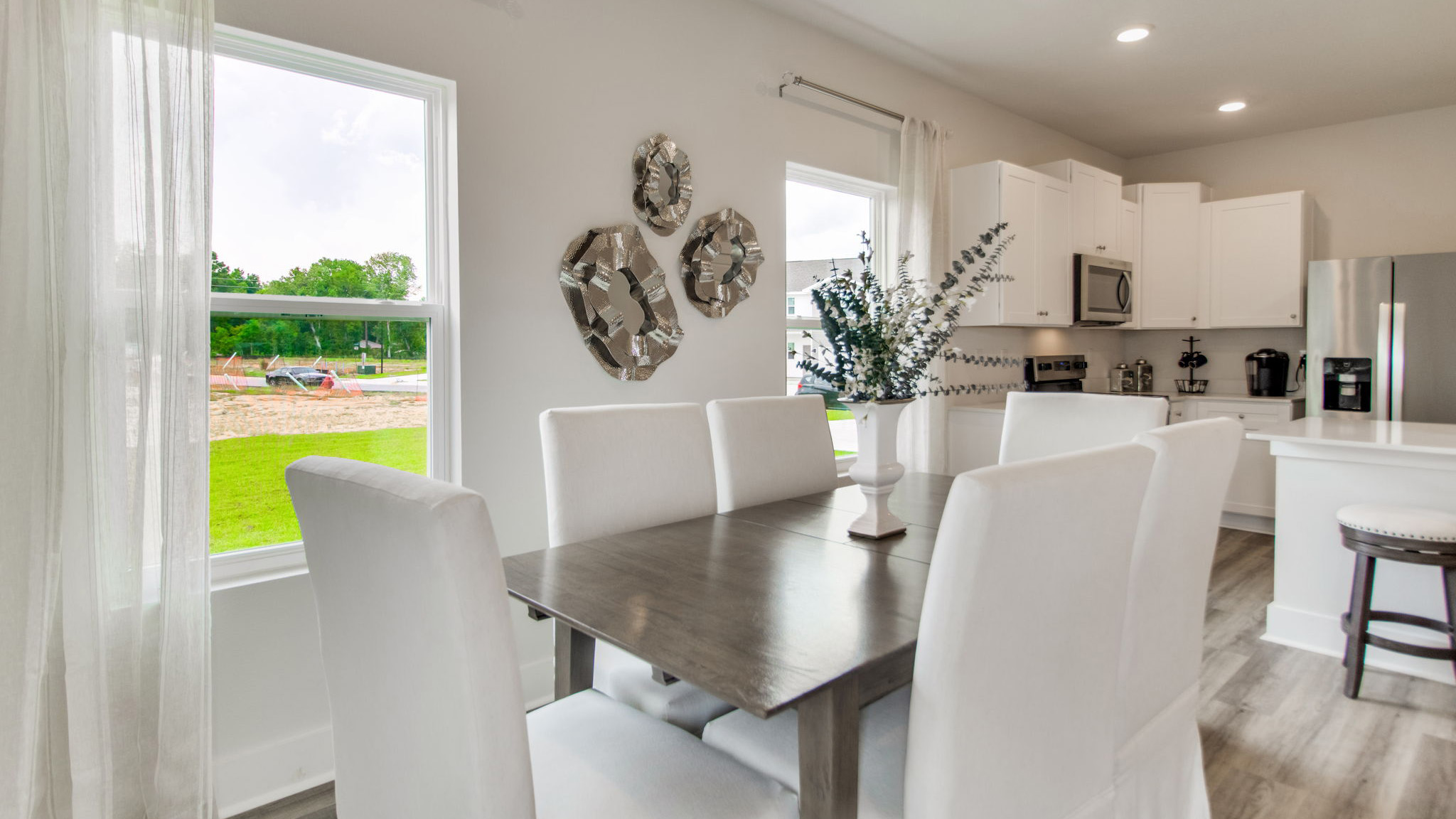 The Palm floorplan open concept dining room and kitchen