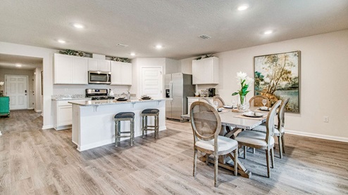 Cali model open concept kitchen and dining room