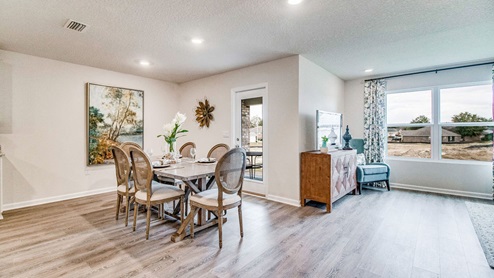 Cali model open concept dining room and living room