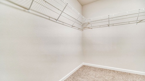 Cali model primary closet with wire shelving