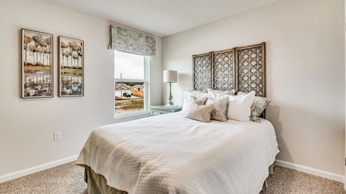 Cali model guest bedroom two with window