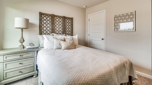 Cali model guest bedroom two with luxury carpet