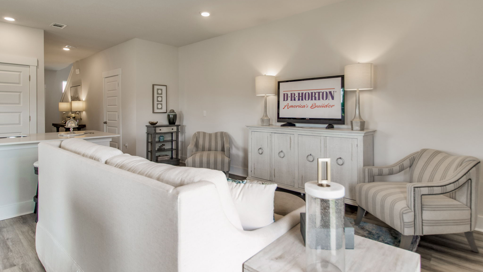 The palm floorplan living room with EVP flooring throughout