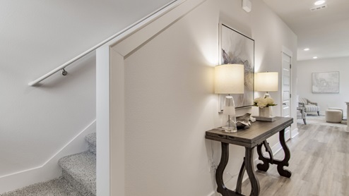 The Palm floorplan kitchen with white shaker style cabinets