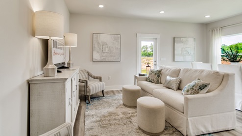 The palm floorplan living room with EVP flooring throughout
