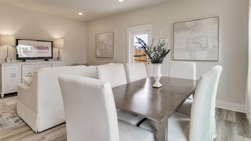 The Palm floorplan dining room with EVP flooring throughout