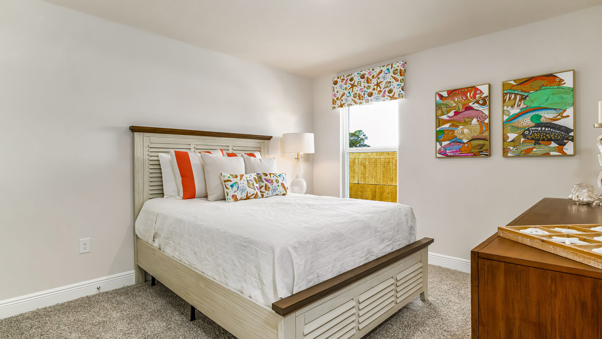 The Sabal floorplan guest bedroom one with carpet throughout