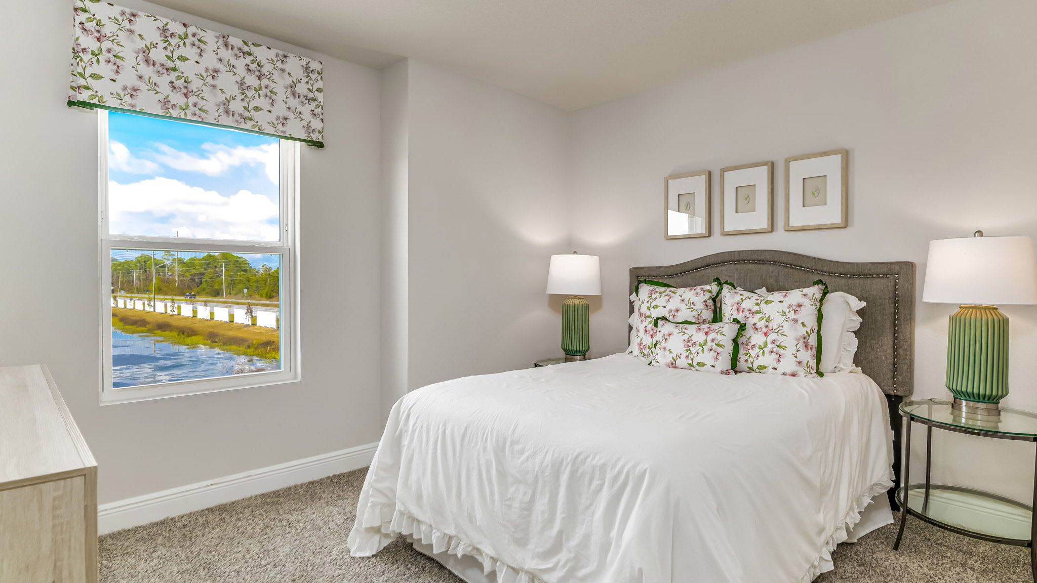 The Sabal floorplan guest bedroom two with carpet throughout