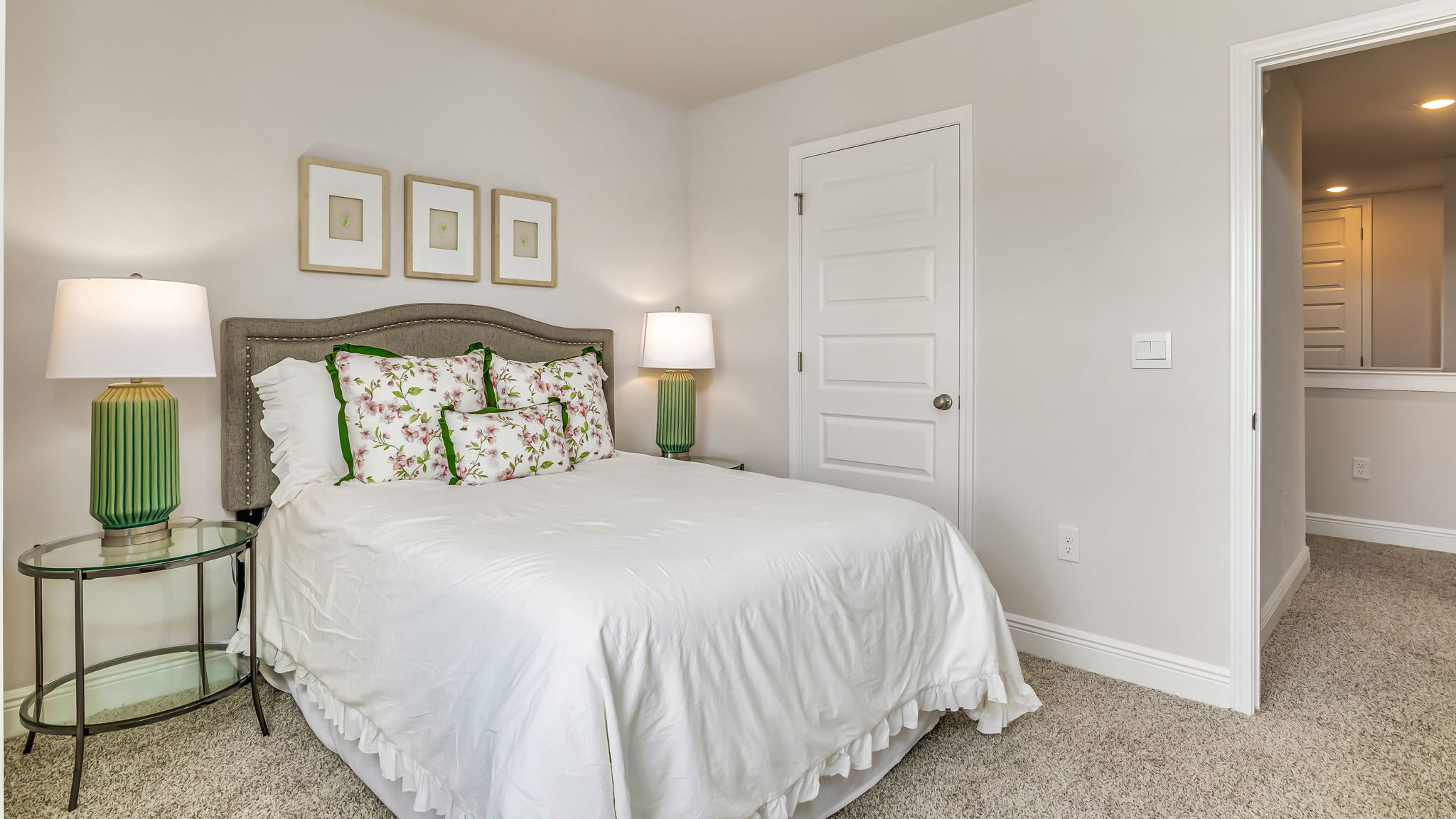 The Sabal floorplan guest bedroom two with carpet throughout