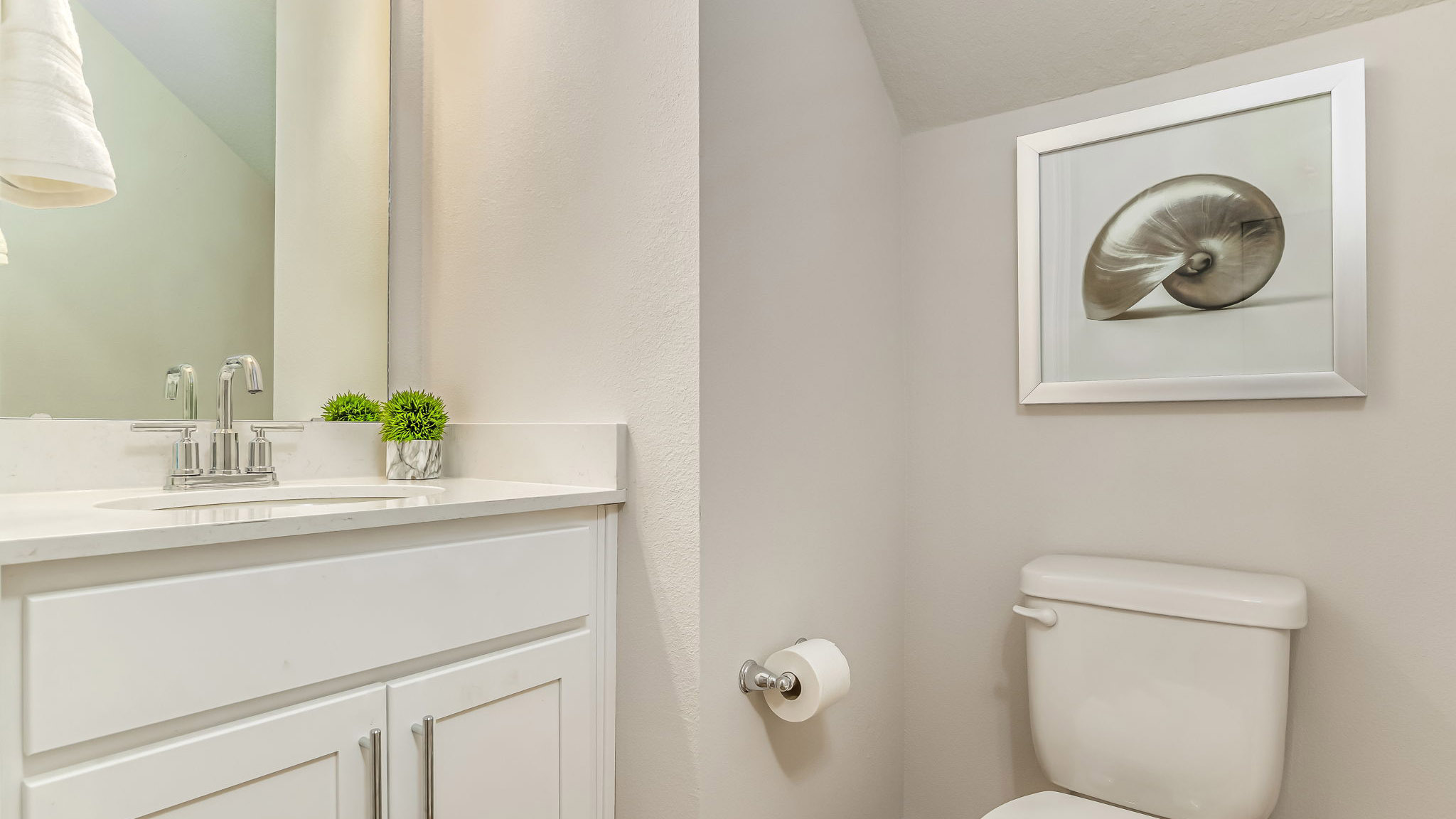 The Sabal floorplan half bathroom located downstairs