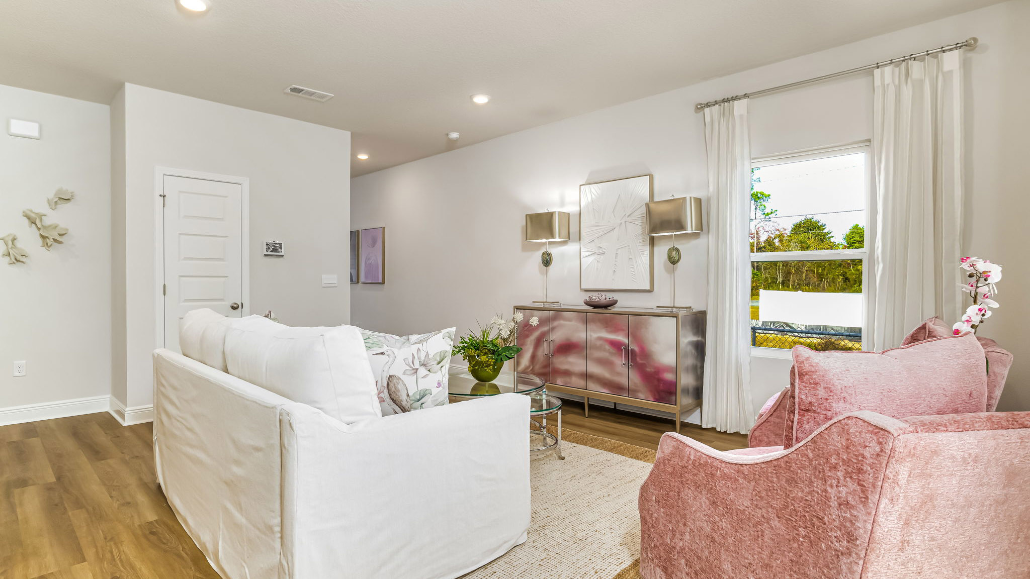 The Sabal floorplan open concept living room, dining room and kitchen