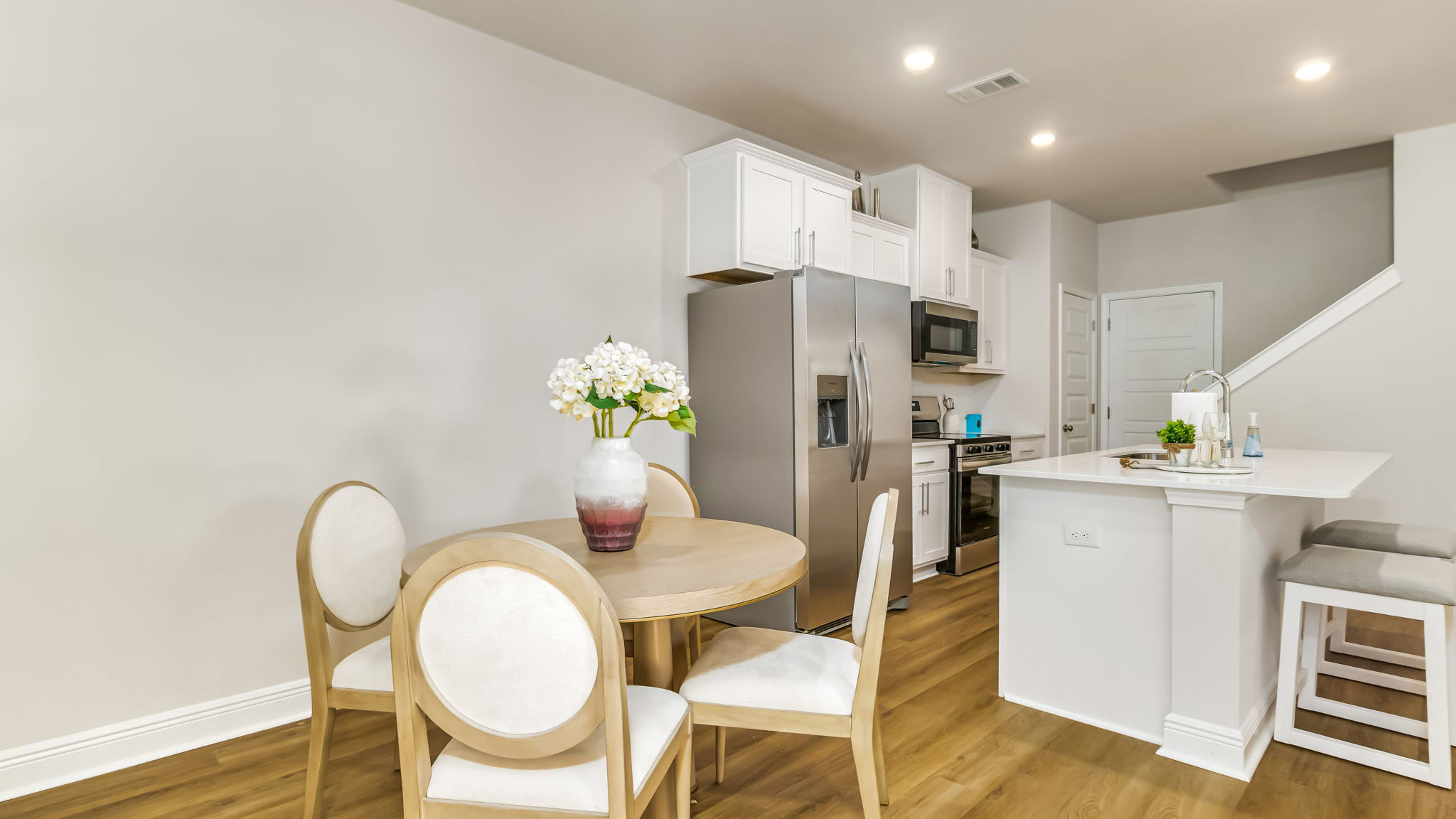 The Sabal floorplan dining room with EVP flooring throughout