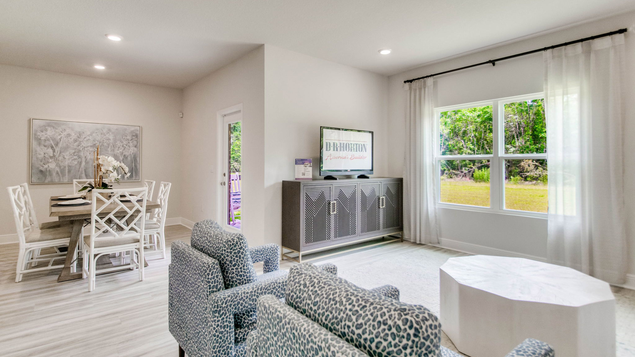 The Beau floorplan living room with EVP flooring throughout