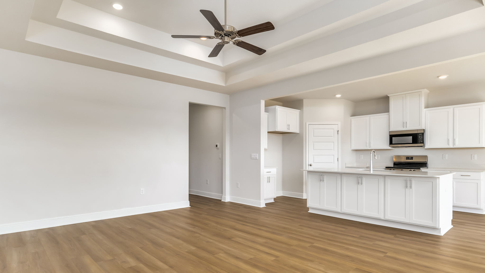 The Madison floorplan living room with tray ceilings