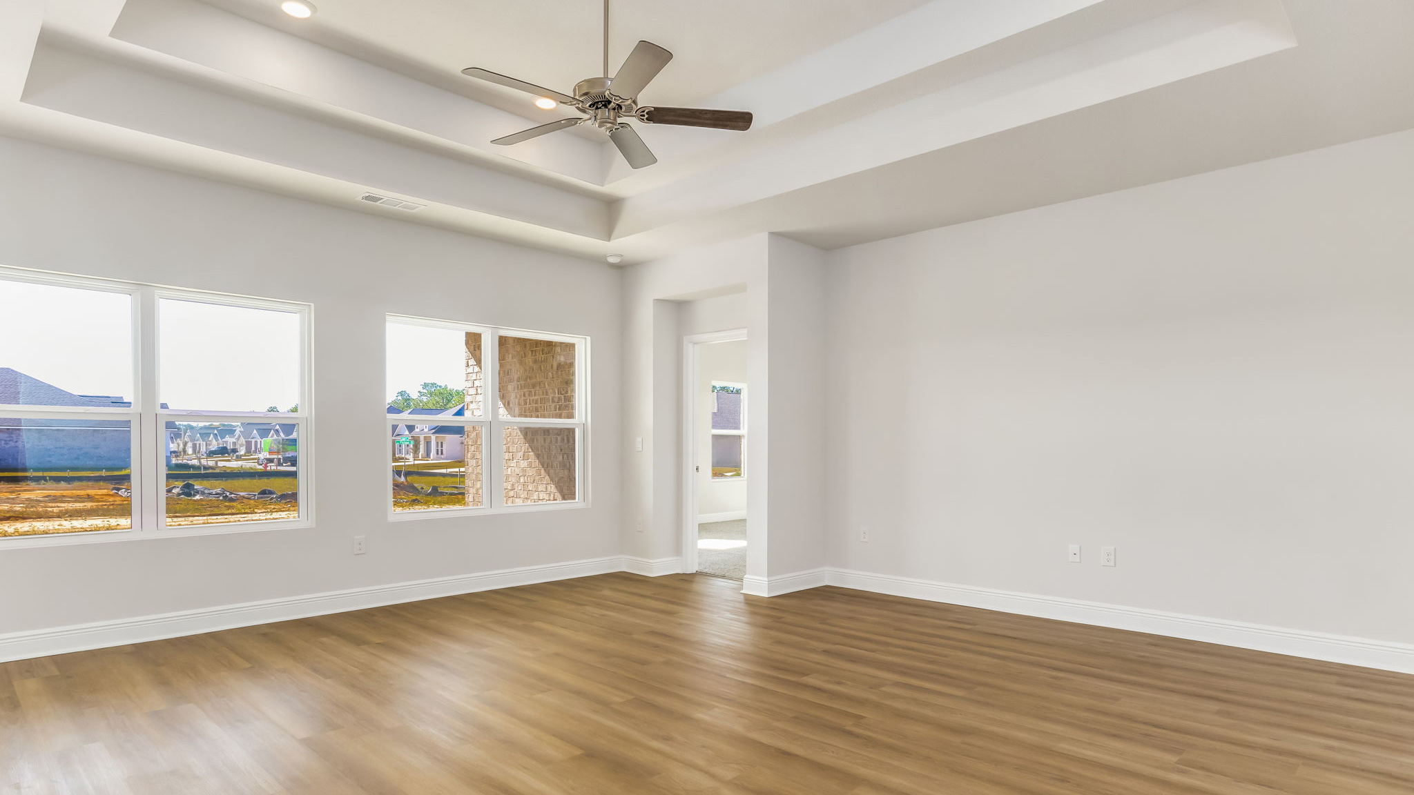 The Madison floorplan living room with EVP flooring throughout