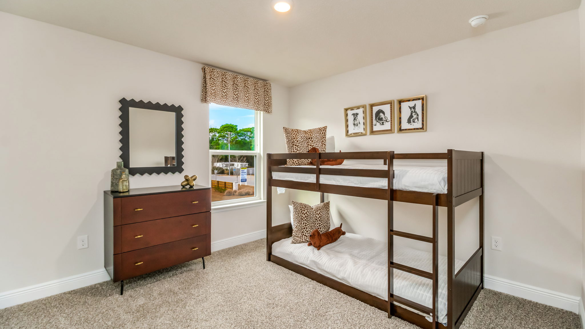 The Belfort floorplan guest bedroom three with one window and carpet throughout
