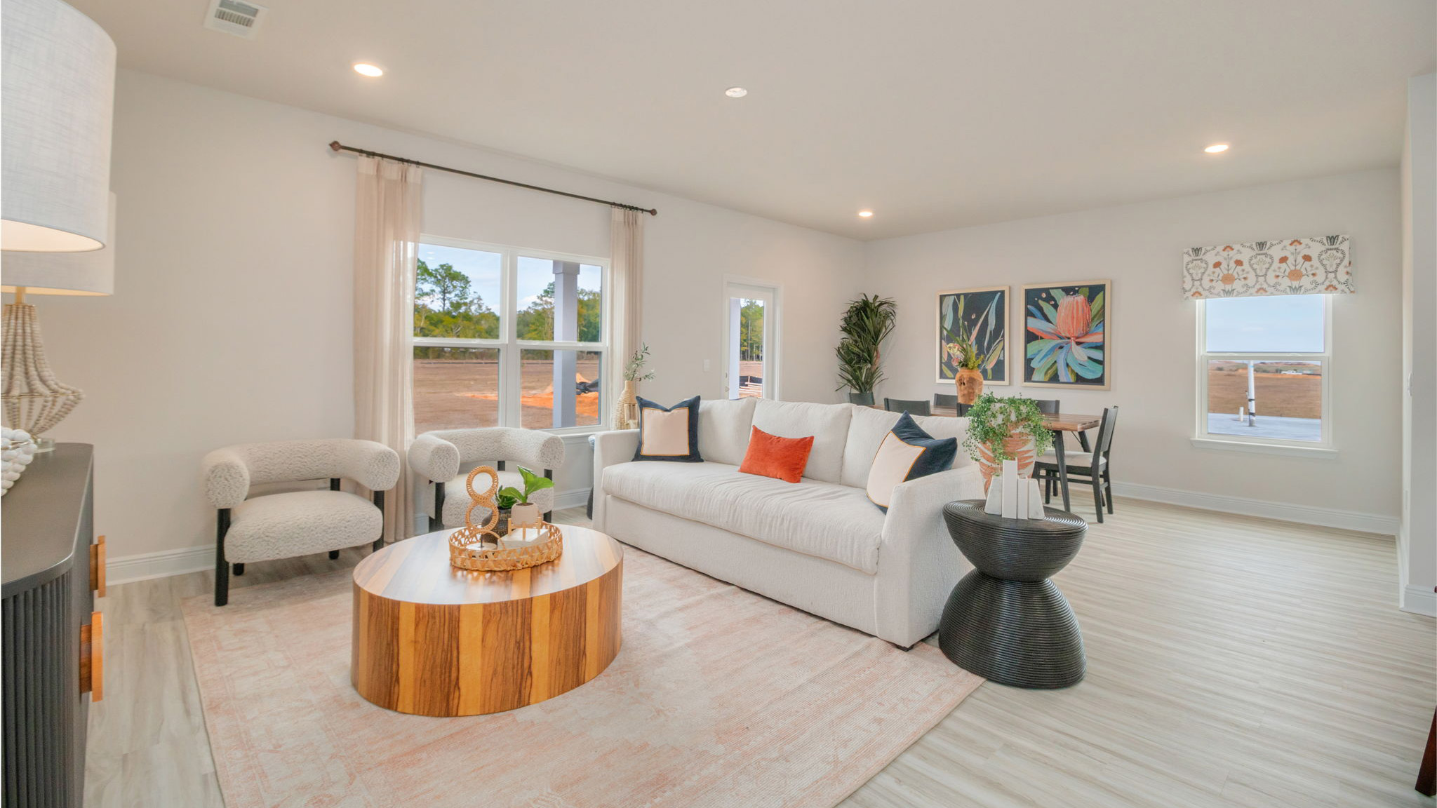 The Belfort floorplan dining room with EVP flooring throughout