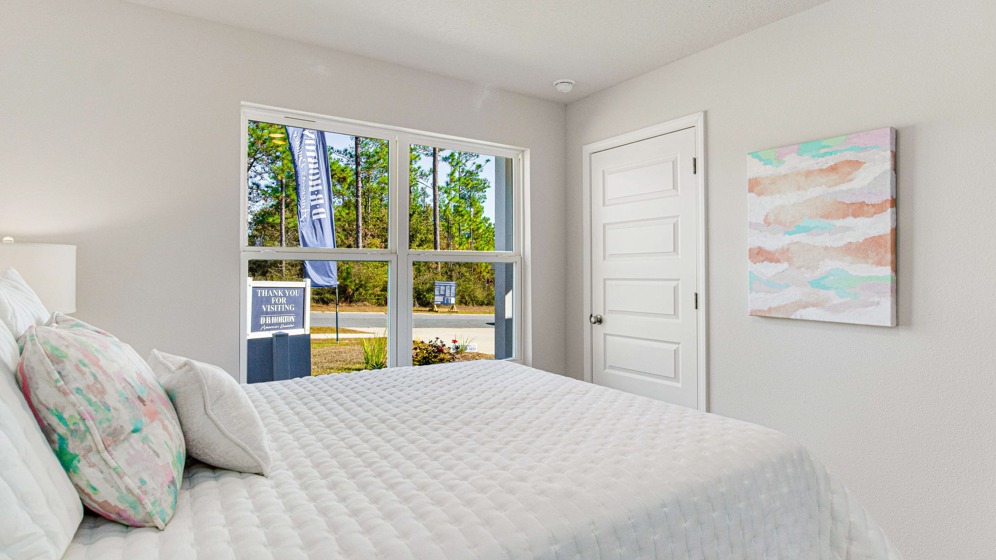 The Cali floorplan guest bedroom two with carpet throughout