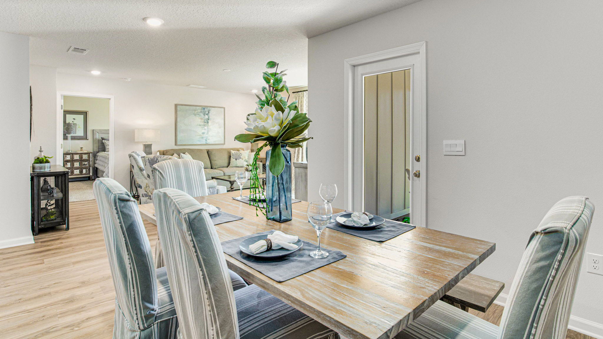 The Cali floorplan dining space with EVP flooring throughout