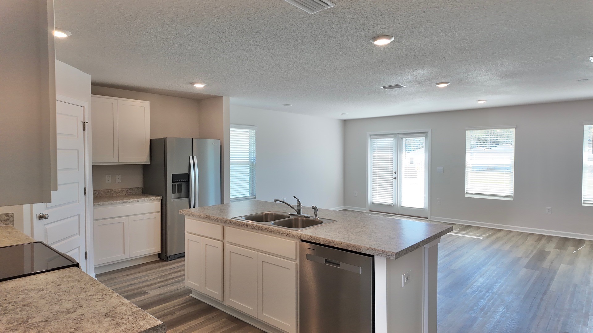 The Lismore floorplan open concept living, dining and kitchen space