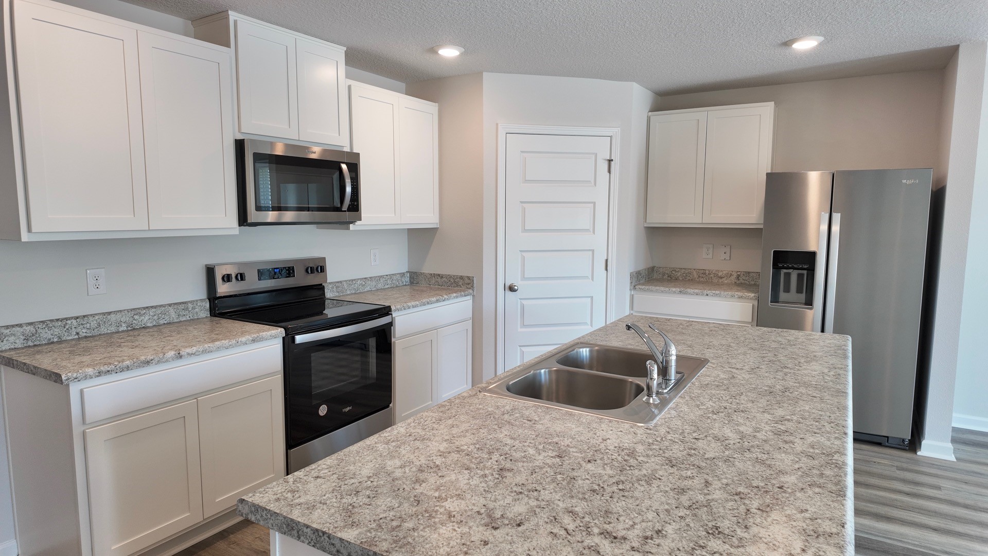 The Lismore floorplan kitchen island with Formica countertops