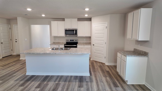 The Lakeside floorplan kitchen with stainless steel appliances