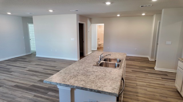 The Lakeside floorplan kitchen island with Formica countertops