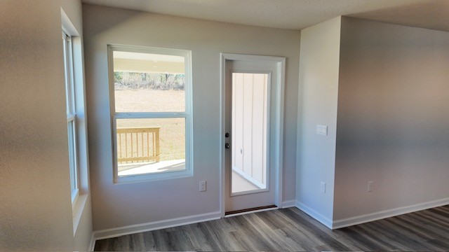 The Lakeside floorplan living room with back patio access