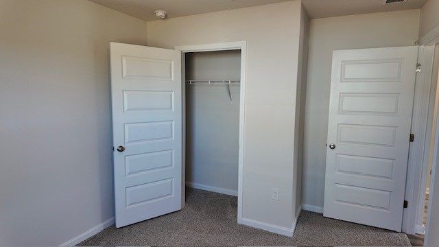 The Lakeside floorplan guest bedroom one with window view