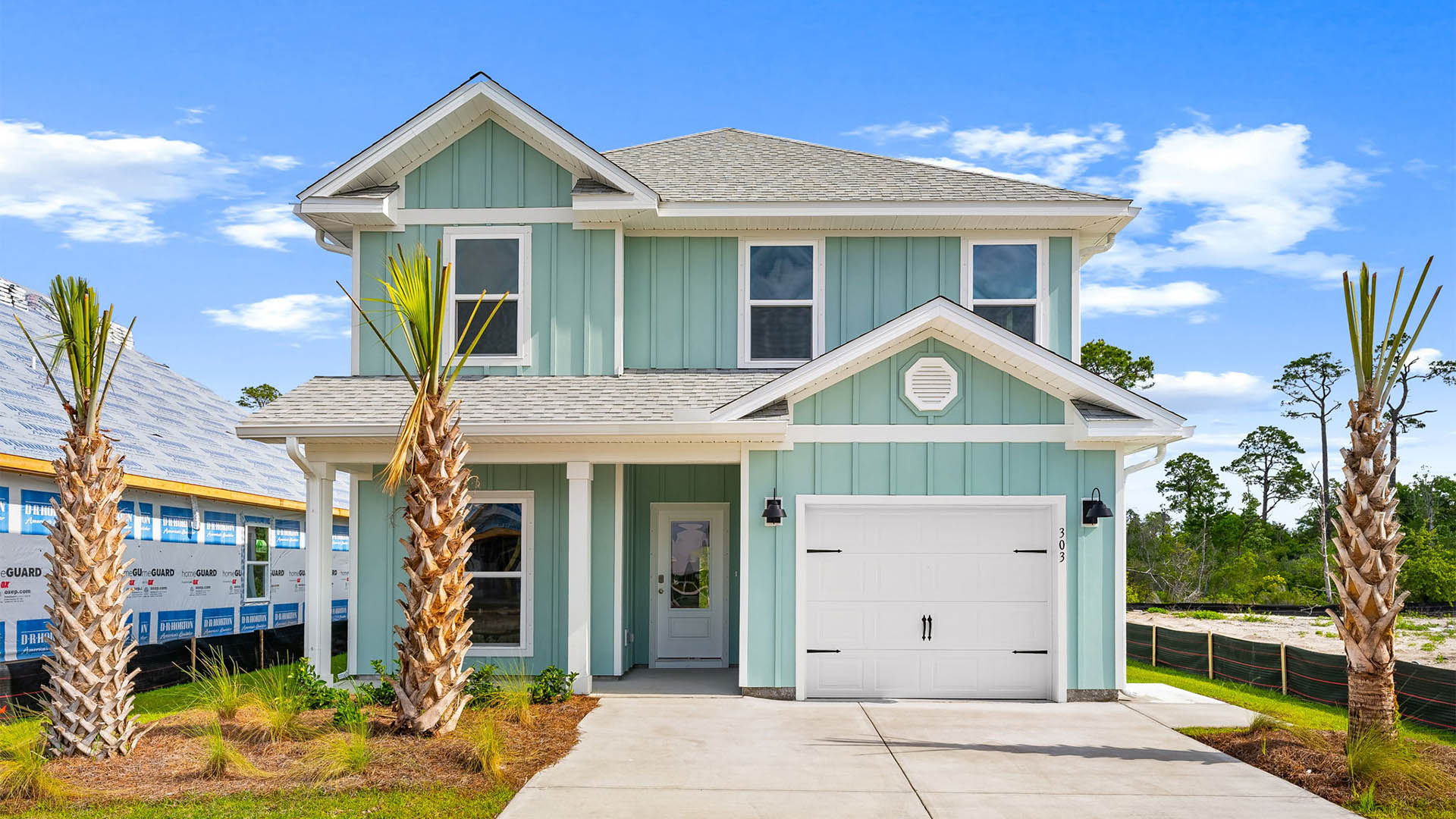 Alabaster floor plan at WindMark Beach with Hardie siding and covered front porch and single car garage.