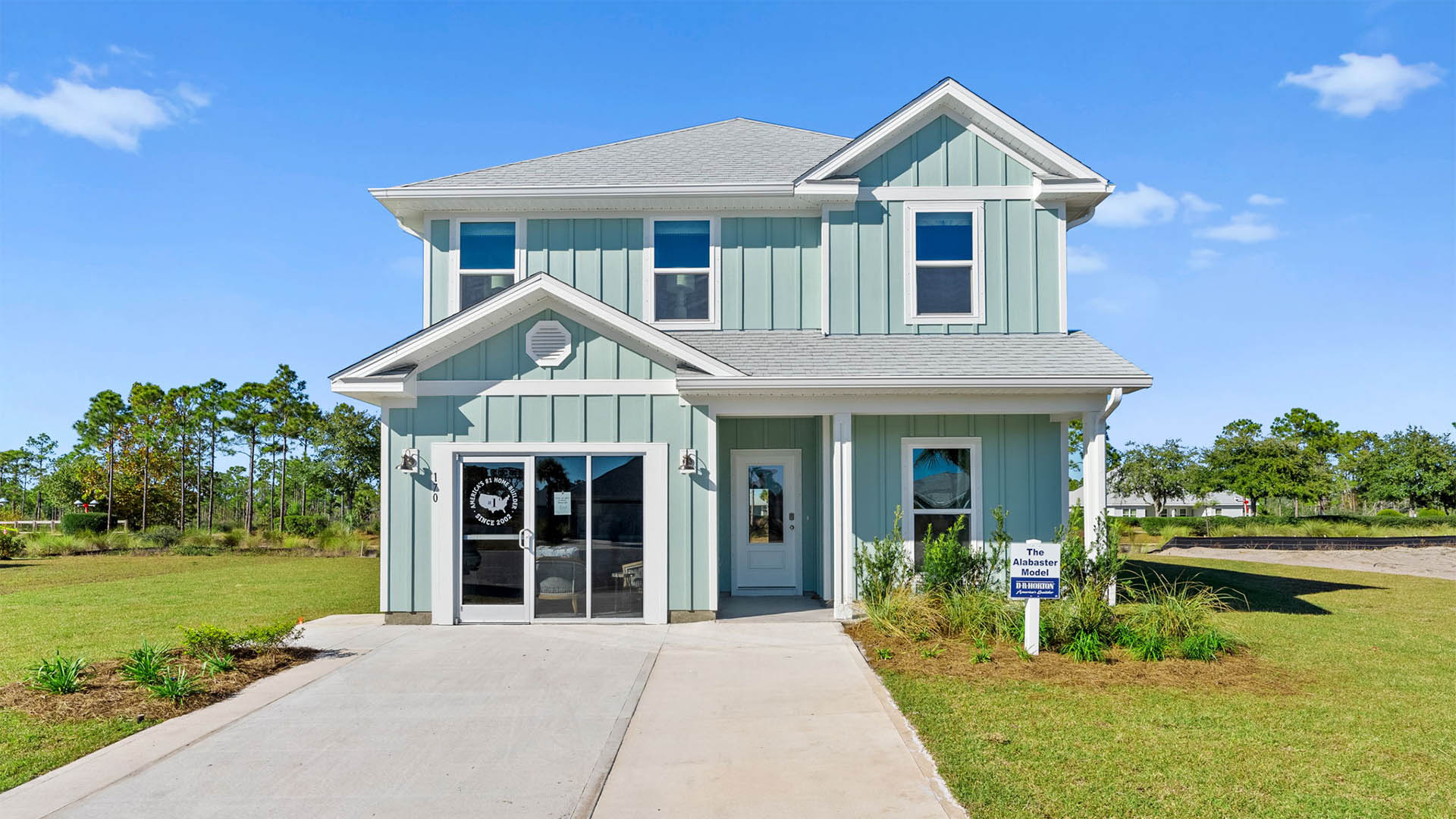 Alabaster floor plan at WindMark Beach with Hardie siding and covered front porch and single car garage.