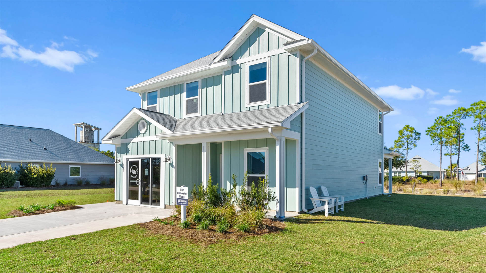 Alabaster floor plan at WindMark Beach with Hardie siding and covered front porch and single car garage.