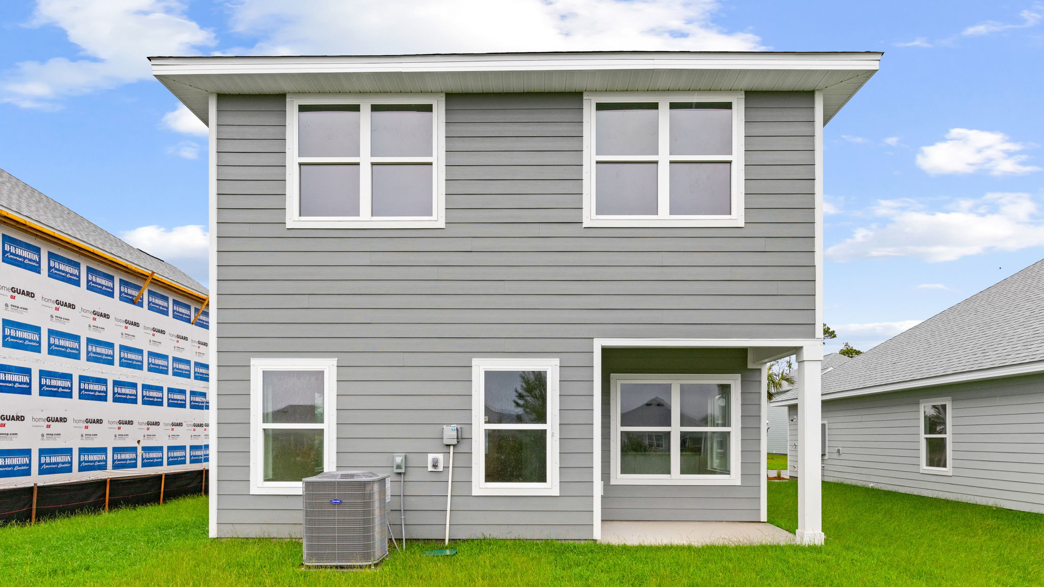 Monroe floor plan at WindMark Beach rear of home with covered rear patio.