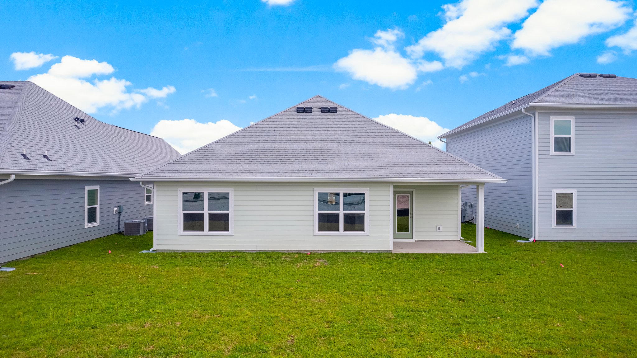 Rhett floor plan at WindMark Beach rear of home with covered pack patio.
