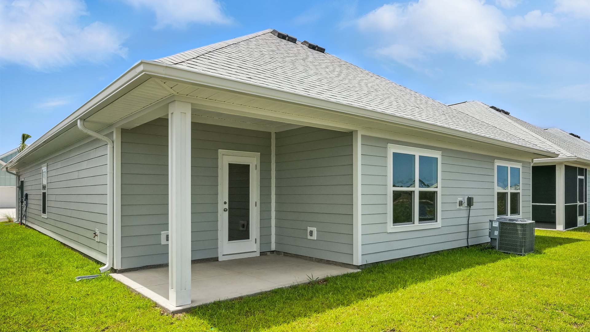 Rhett floor plan at WindMark Beach rear of home with covered pack patio.