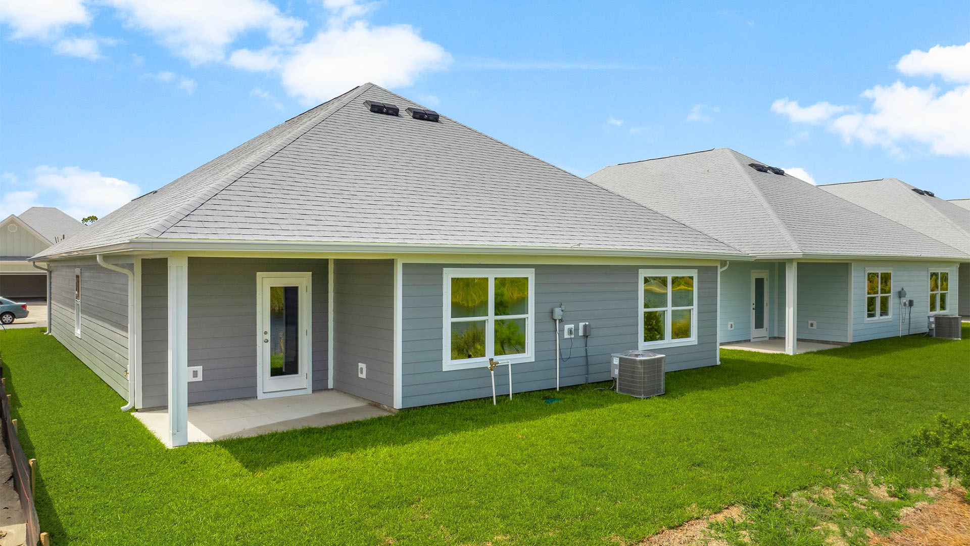 Rhett floor plan at WindMark Beach rear of home with covered pack patio.