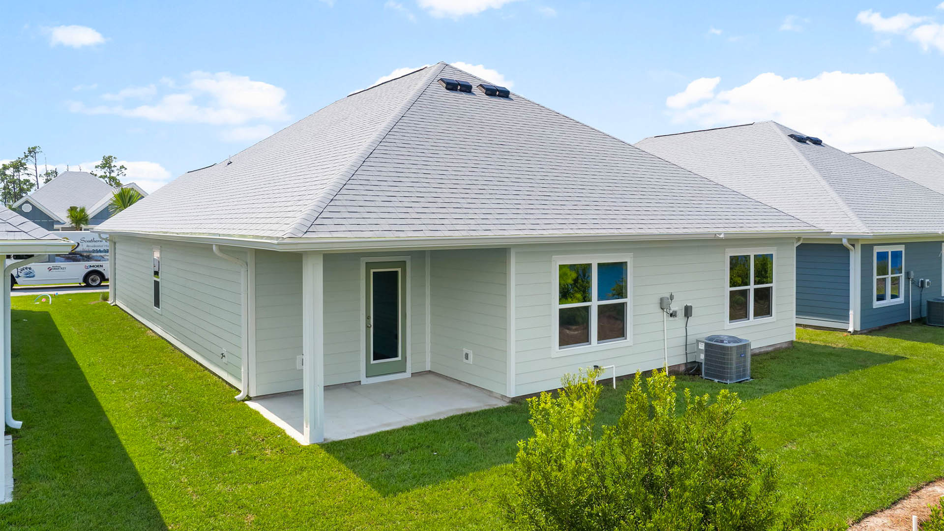 Rhett floor plan at WindMark Beach rear of home with covered pack patio.