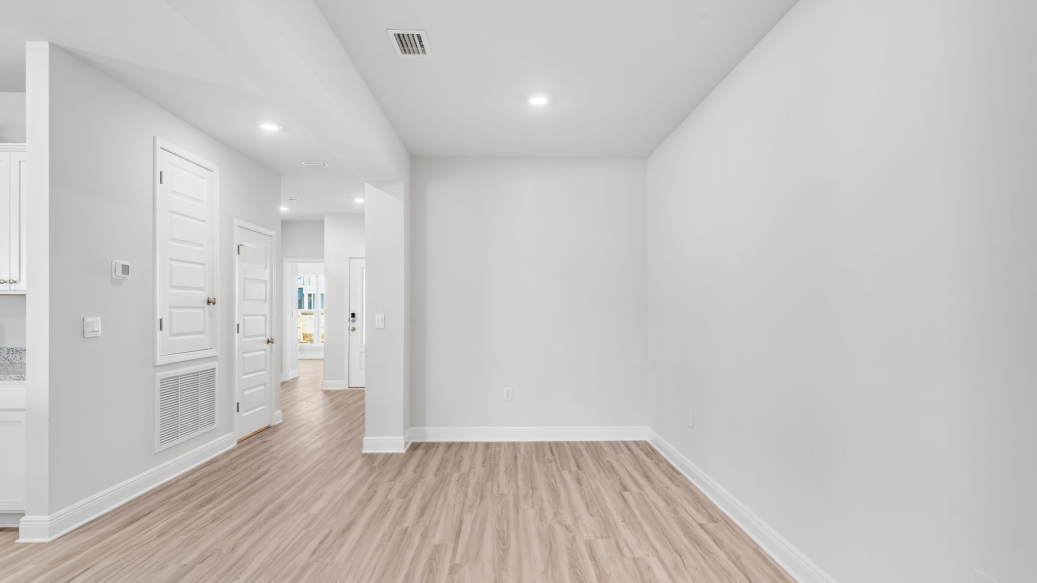 Dining room with EVP flooring.