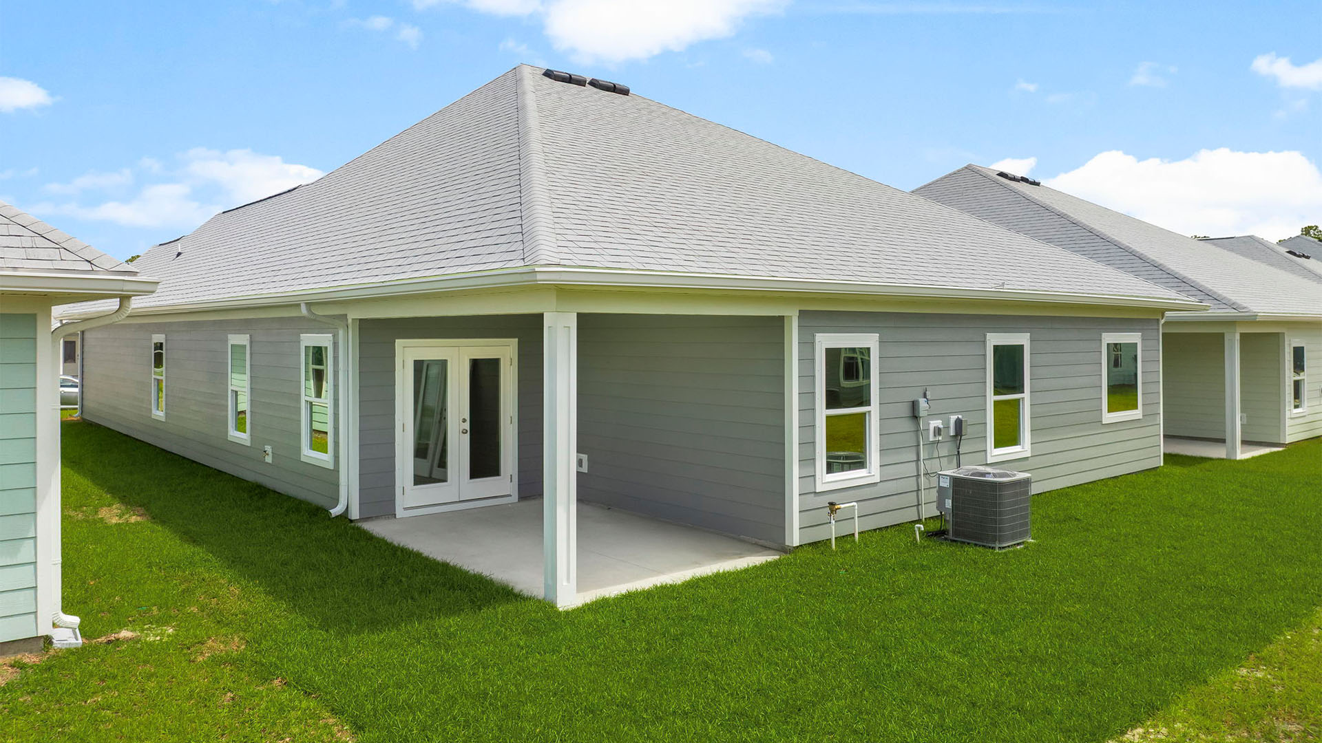 Kennedy floor plan at WindMark Beach with covered rear patio.