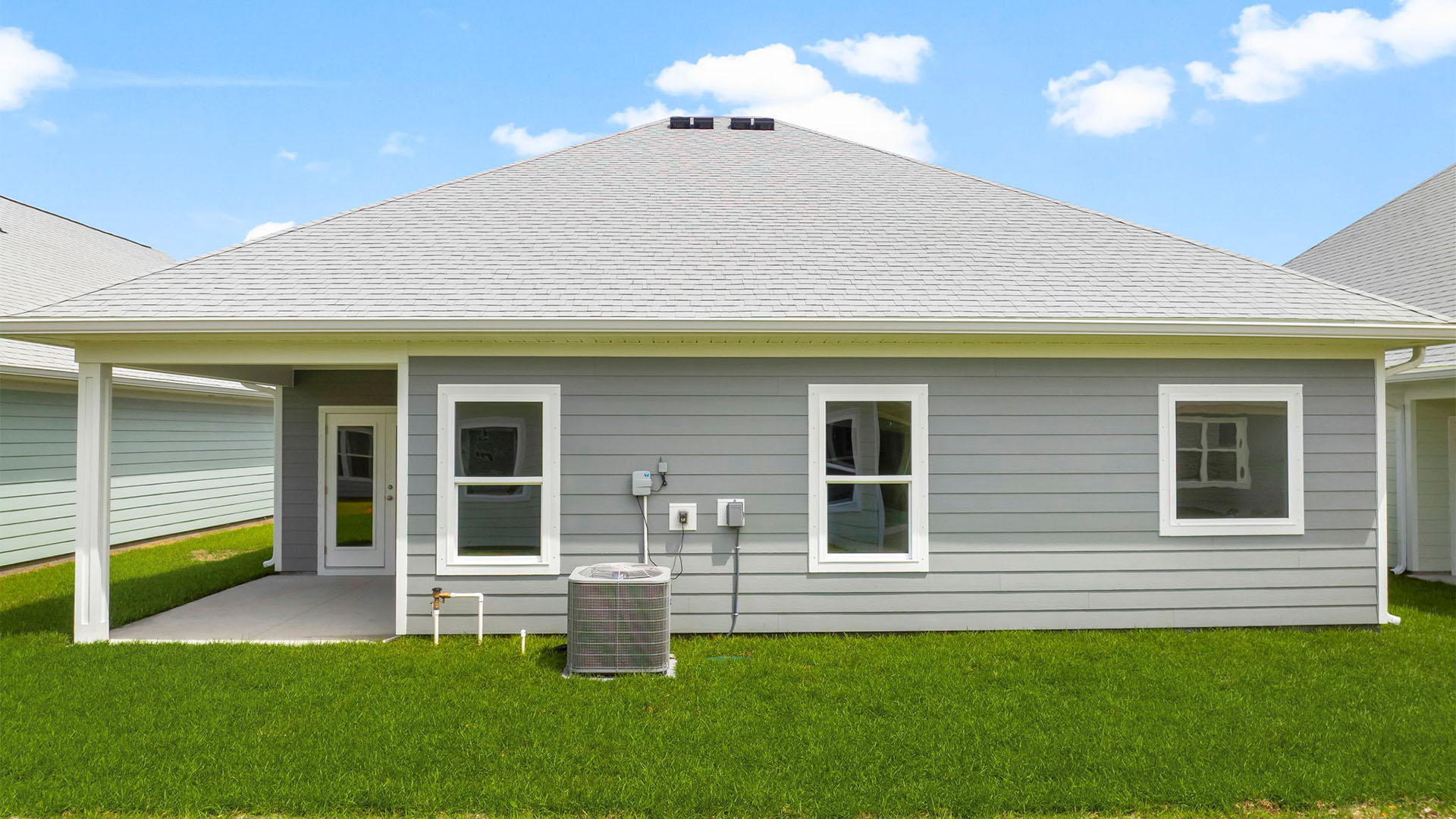 Kennedy floor plan at WindMark Beach with covered rear patio.