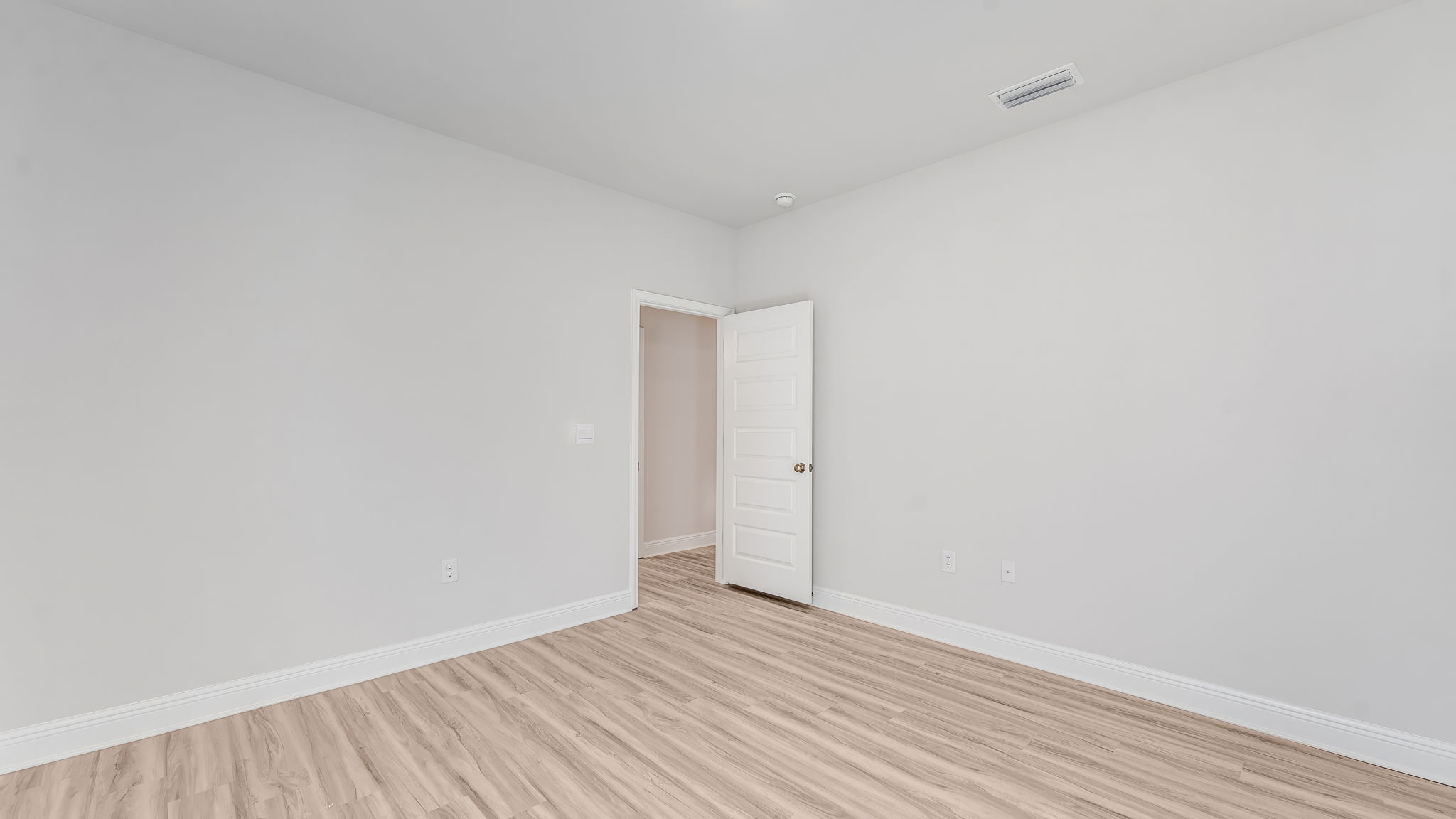 Bedroom with EVP flooring.