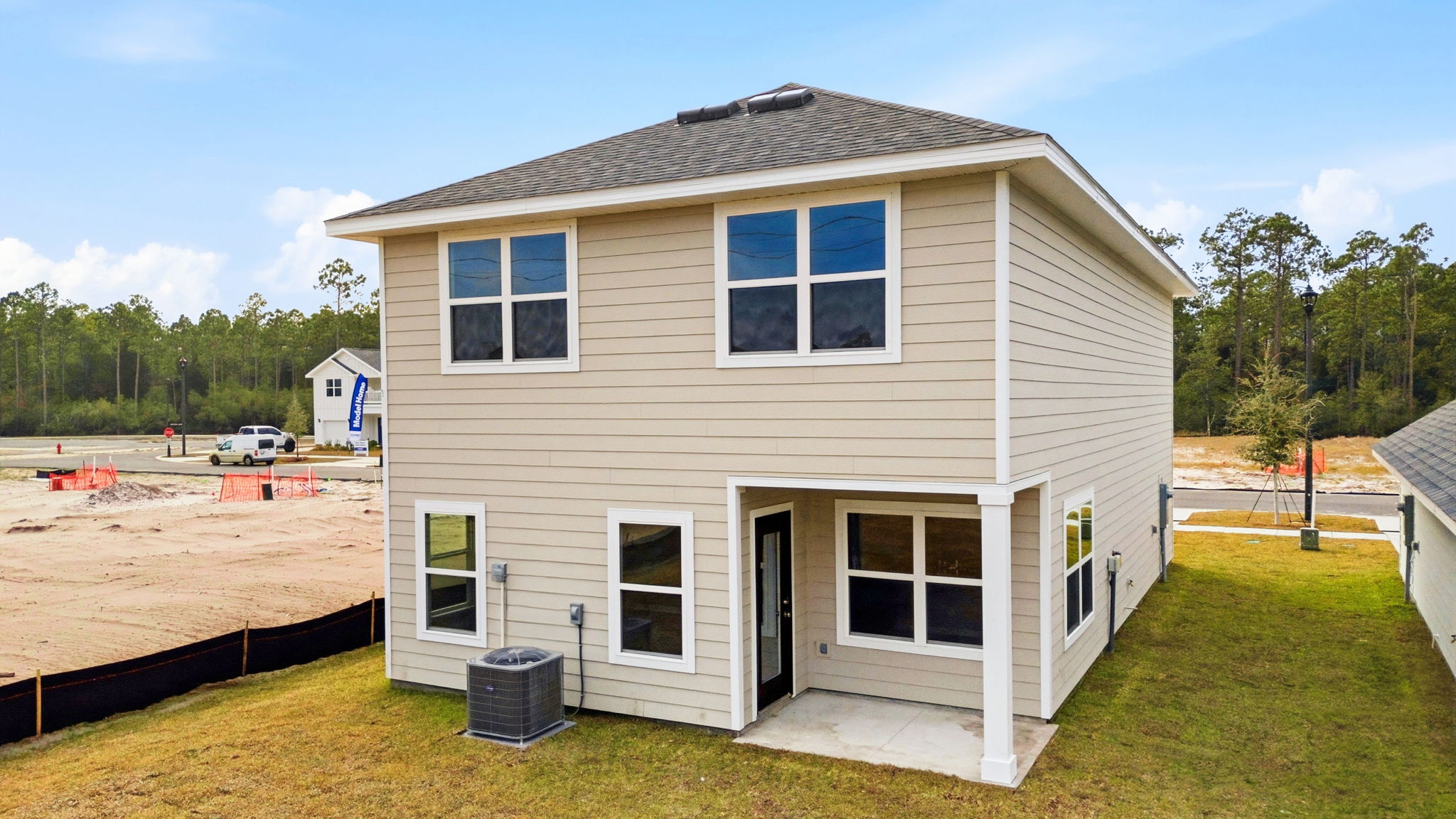 Monroe floor plan at WindMark Beach rear of home with covered rear patio.